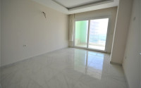 Spacious 1+1 apartments with fine finishing in the center of Mahmutlar and 200 meters from the sea.-id-4344-photo-4