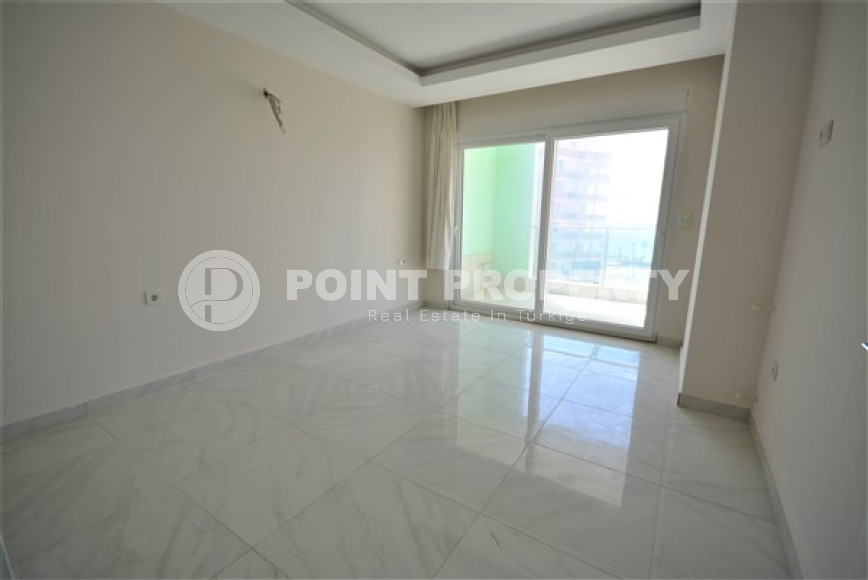 Spacious 1+1 apartments with fine finishing in the center of Mahmutlar and 200 meters from the sea.-id-4344-photo-4