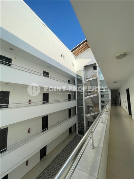 Small budget apartment 1+1 on the 3rd floor in a building built in 2011 with a swimming pool and garden.-id-4345-photo-9