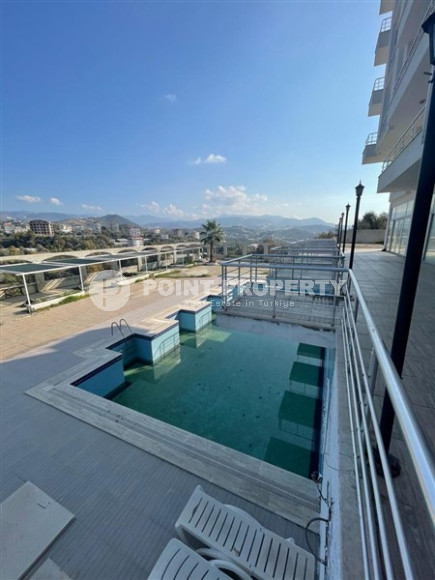 Small budget apartment 1+1 on the 3rd floor in a building built in 2011 with a swimming pool and garden.-id-4345-photo-13