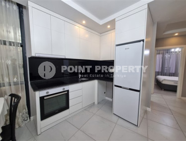 Новая комфортабельная квартира с современным дизайном в 350 метрах от моря в экологически чистом районе Тосмур.-id-4346-фото-2