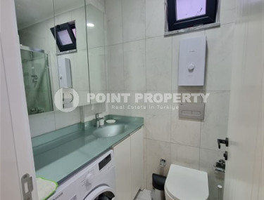 Новая комфортабельная квартира с современным дизайном в 350 метрах от моря в экологически чистом районе Тосмур.-id-4346-фото-4