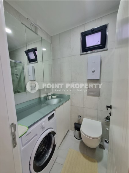 Новая комфортабельная квартира с современным дизайном в 350 метрах от моря в экологически чистом районе Тосмур.-id-4346-фото-4