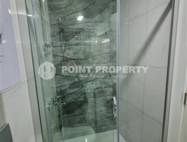 Новая комфортабельная квартира с современным дизайном в 350 метрах от моря в экологически чистом районе Тосмур.-id-4346-фото-5