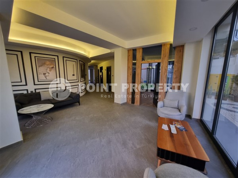 Новая комфортабельная квартира с современным дизайном в 350 метрах от моря в экологически чистом районе Тосмур.-id-4346-фото-11