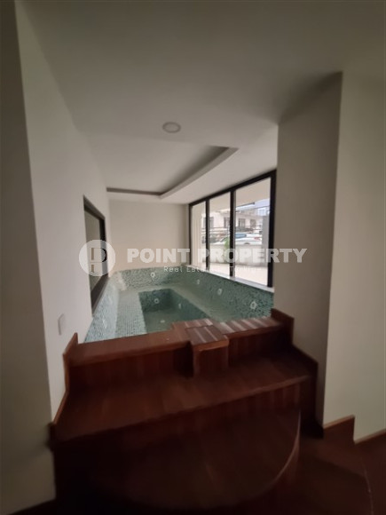 Новая комфортабельная квартира с современным дизайном в 350 метрах от моря в экологически чистом районе Тосмур.-id-4346-фото-12