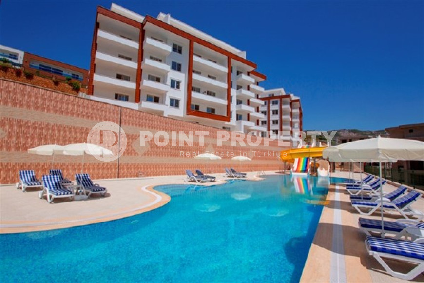 Готовые к проживанию 3+1 апартаменты с двумя балконами на удалении от моря в районе Каргыджак-id-4357-фото-11