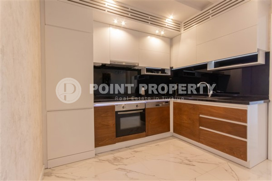 Bright modern 1+1 apartment 500 meters from the sea in the center of Mahmutlar.-id-4360-photo-5