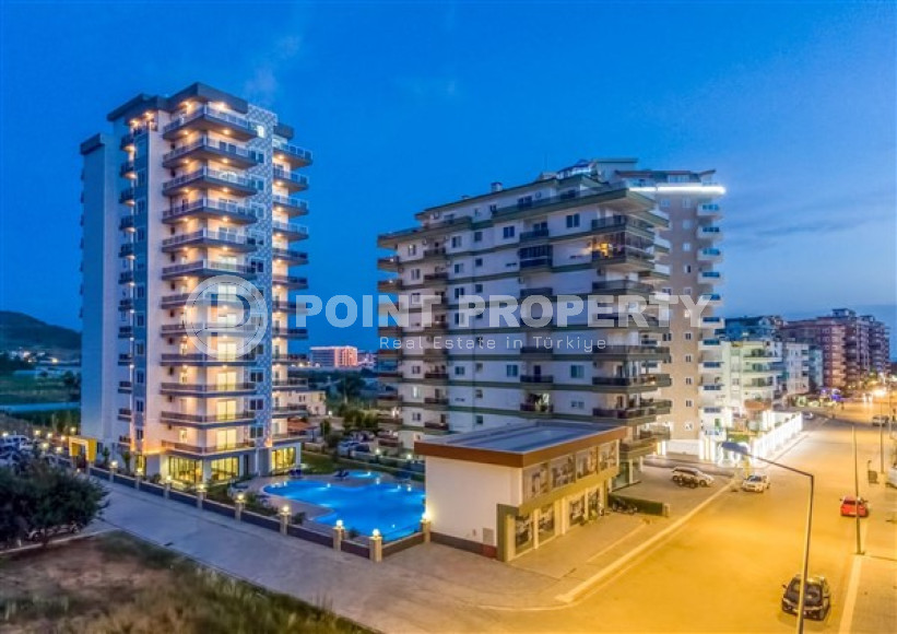 Bright modern 1+1 apartment 500 meters from the sea in the center of Mahmutlar.-id-4360-photo-10