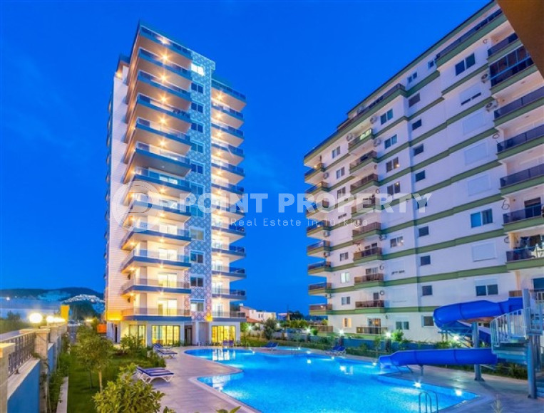 Bright modern 1+1 apartment 500 meters from the sea in the center of Mahmutlar.-id-4360-photo-11