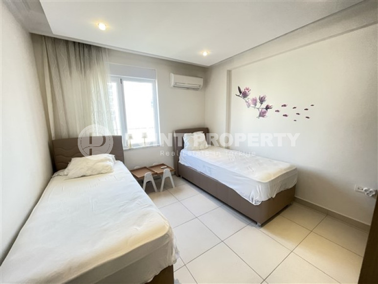 Просторные апартаменты 2+1 на 2-м этаже в 500 метрах от моря в центре спокойного района Авсаллар.-id-4364-фото-7