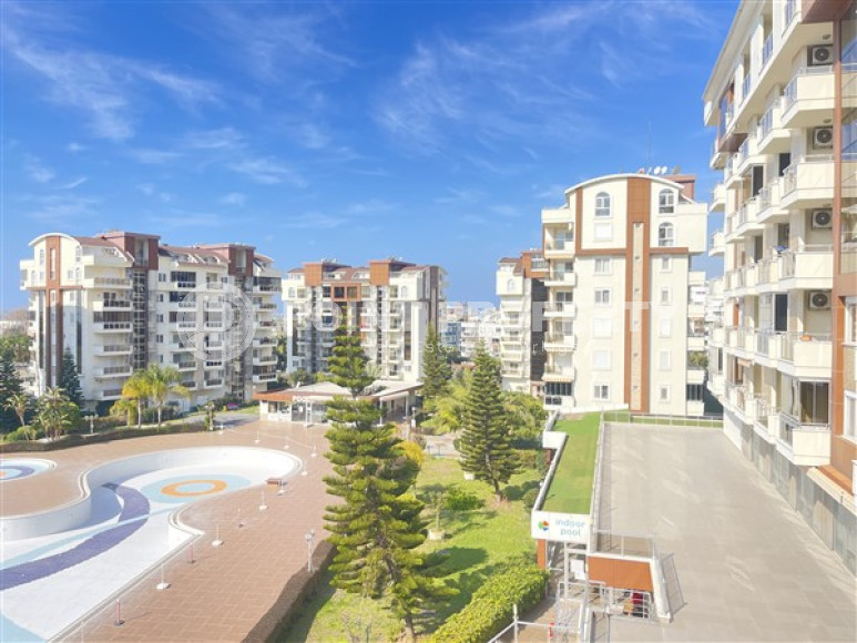 Просторные апартаменты 2+1 на 2-м этаже в 500 метрах от моря в центре спокойного района Авсаллар.-id-4364-фото-11