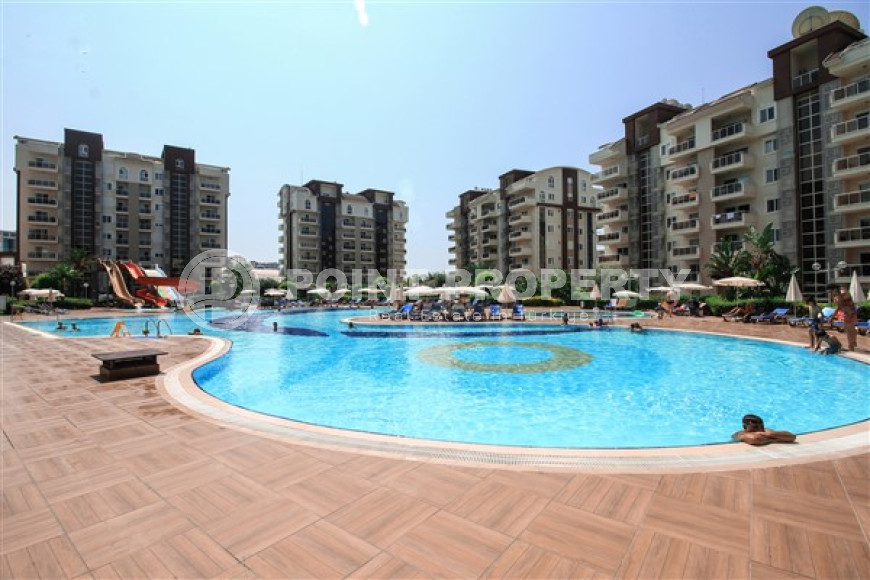 Меблированные апартаменты с двумя спальными комнатами на 4-м этаже в доме с бассейнами и фитнес клубом.-id-4365-фото-10