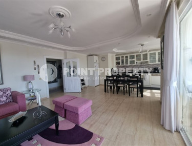 Beautiful bright 3+1 apartment on the 8th floor with panoramic views of the Taurus Mountains.-id-4366-photo-1