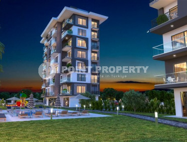 Апартаменты 1+1 с чистовой отделкой в 300 метрах от моря в экологически чистом районе Демирташ.-id-4368-фото-2