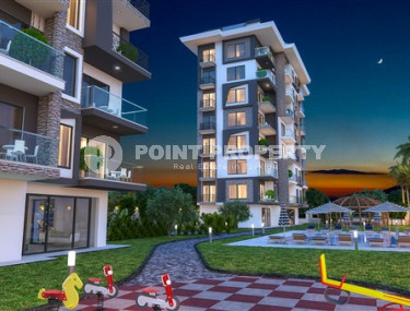 Апартаменты 1+1 с чистовой отделкой в 300 метрах от моря в экологически чистом районе Демирташ.-id-4368-фото-4