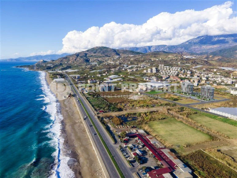 Апартаменты 1+1 с чистовой отделкой в 300 метрах от моря в экологически чистом районе Демирташ.-id-4368-фото-6