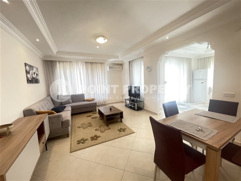 Bright spacious 2+1 apartment 350 meters from the beach and promenade in the center of Alanya.-id-4369-photo-1
