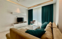 Large one-bedroom apartment, 67m², in an elite complex in Mahmutlar, 200m from the sea-id-2132-photo-1