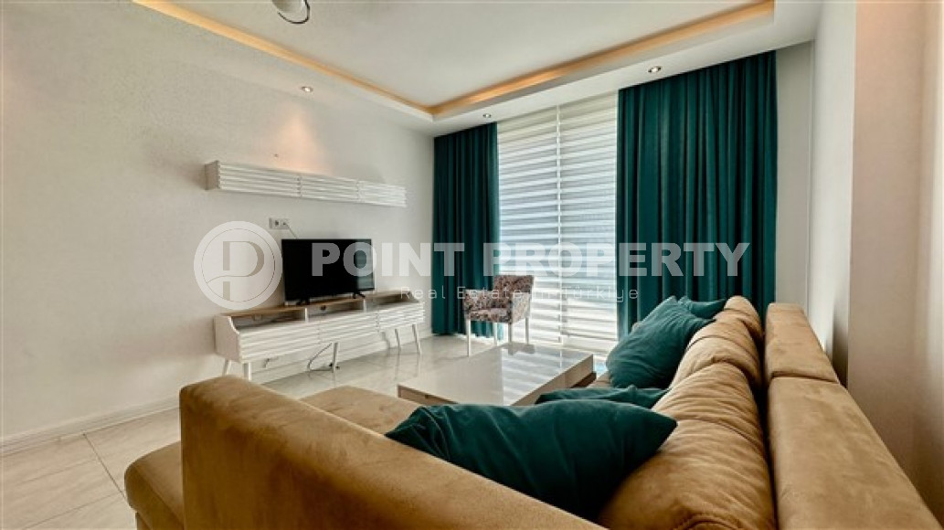 Large one-bedroom apartment, 67m², in an elite complex in Mahmutlar, 200m from the sea-id-2132-photo-1