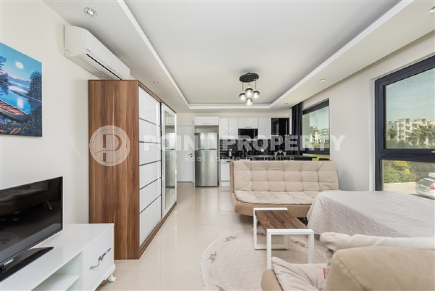 Компактная студия 1+0 с площадью 40 м2 в 700 метрах от моря, район Авсаллар-id-4377-фото-2