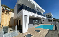 New two-storey 3+1 villa with luxurious panoramic sea views in the elite Bektash area of Alanya.-id-4382-photo-1