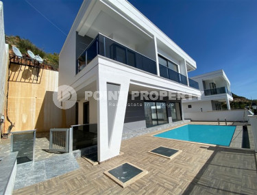 New two-storey 3+1 villa with luxurious panoramic sea views in the elite Bektash area of Alanya.-id-4382-photo-1