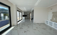 New two-storey 3+1 villa with luxurious panoramic sea views in the elite Bektash area of Alanya.-id-4382-photo-2