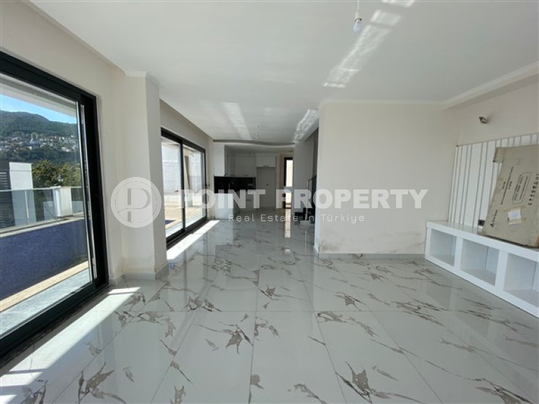 New two-storey 3+1 villa with luxurious panoramic sea views in the elite Bektash area of Alanya.-id-4382-photo-2