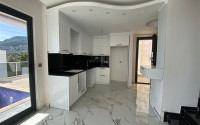 New two-storey 3+1 villa with luxurious panoramic sea views in the elite Bektash area of Alanya.-id-4382-photo-3