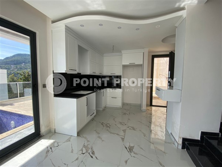 New two-storey 3+1 villa with luxurious panoramic sea views in the elite Bektash area of Alanya.-id-4382-photo-3