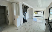 New two-storey 3+1 villa with luxurious panoramic sea views in the elite Bektash area of Alanya.-id-4382-photo-4