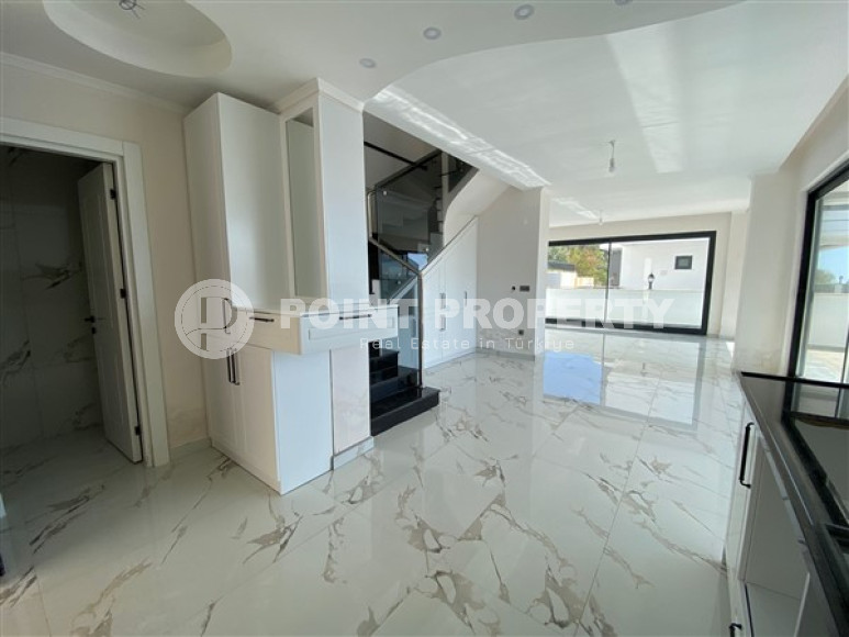 New two-storey 3+1 villa with luxurious panoramic sea views in the elite Bektash area of Alanya.-id-4382-photo-4