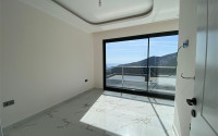 New two-storey 3+1 villa with luxurious panoramic sea views in the elite Bektash area of Alanya.-id-4382-photo-9