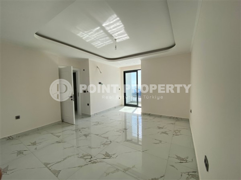 New two-storey 3+1 villa with luxurious panoramic sea views in the elite Bektash area of Alanya.-id-4382-photo-11