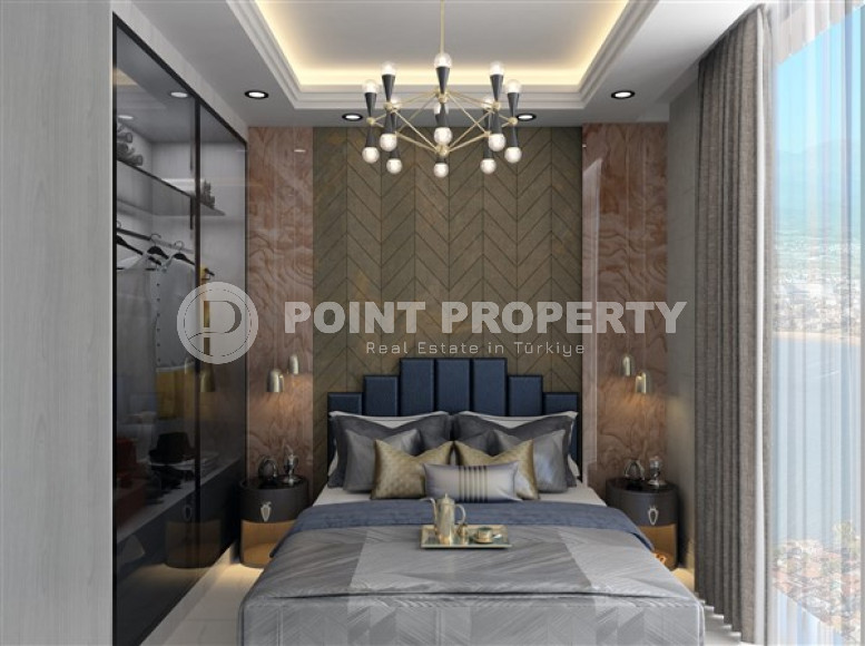 Небольшая квартира 1+1 в новом жилом комплексе на этапе строительства в зеленом экологически чистом районе Демирташ.-id-4385-фото-8