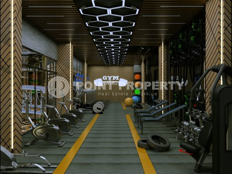 Небольшая квартира 1+1 в новом жилом комплексе на этапе строительства в зеленом экологически чистом районе Демирташ.-id-4385-фото-11