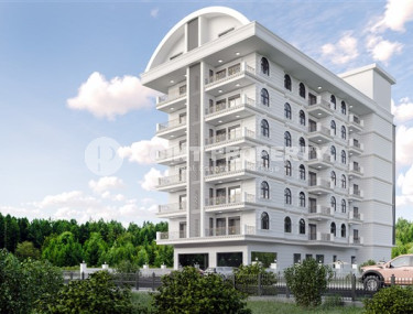 Apartments and commercial real estate in a residential complex under construction with the possibility of obtaining installments and a residence permit in Turkey.-id-4387-photo-1