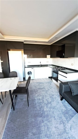 Новые апартаменты 1+1 в доме, введенном в эксплуатацию в 2022 году, в экологически чистом районе Газипаша.-id-4389-фото-2