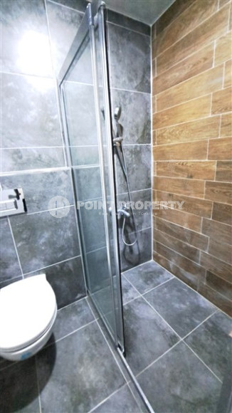 Новые апартаменты 1+1 в доме, введенном в эксплуатацию в 2022 году, в экологически чистом районе Газипаша.-id-4389-фото-6