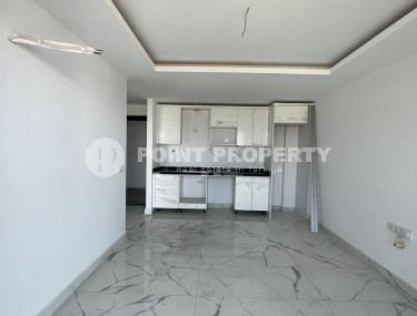 New and inexpensive apartment 51 m2 in a residence built in 2022, Mahmutlar district-id-4391-photo-4