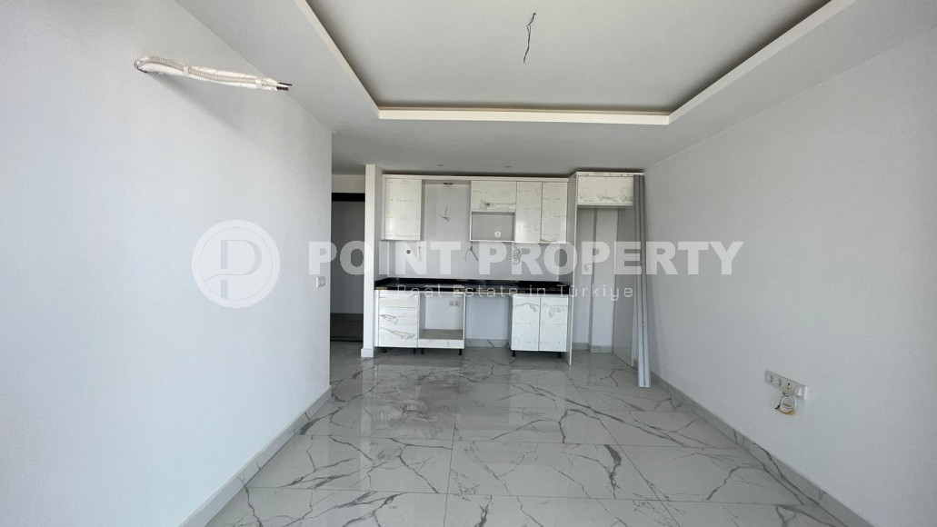 New and inexpensive apartment 51 m2 in a residence built in 2022, Mahmutlar district-id-4391-photo-4