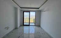 New and inexpensive apartment 51 m2 in a residence built in 2022, Mahmutlar district-id-4391-photo-3