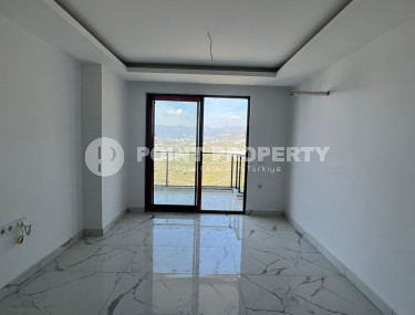 New and inexpensive apartment 51 m2 in a residence built in 2022, Mahmutlar district-id-4391-photo-3