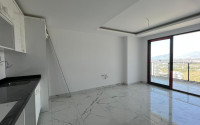 New and inexpensive apartment 51 m2 in a residence built in 2022, Mahmutlar district-id-4391-photo-5