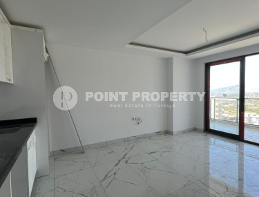 New and inexpensive apartment 51 m2 in a residence built in 2022, Mahmutlar district-id-4391-photo-5