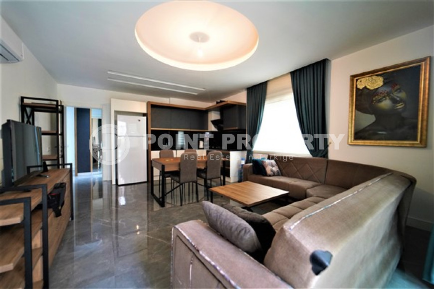 Compact comfortable apartment 2+1 50 meters from the sea in the very center of Alanya.-id-4399-photo-1