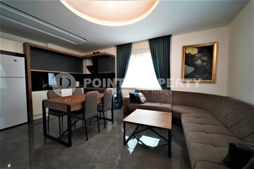 Compact comfortable apartment 2+1 50 meters from the sea in the very center of Alanya.-id-4399-photo-3