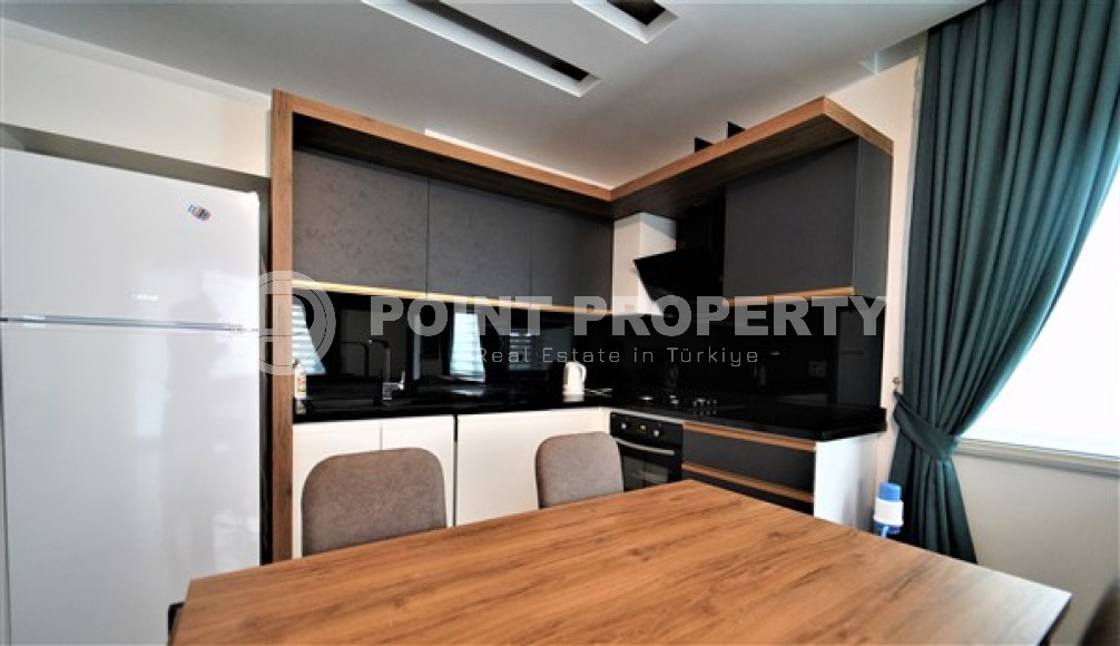 Compact comfortable apartment 2+1 50 meters from the sea in the very center of Alanya.-id-4399-photo-4