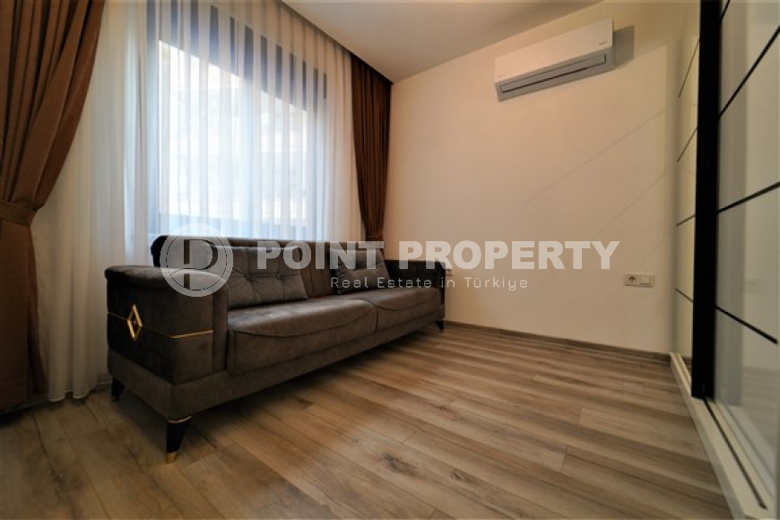Compact comfortable apartment 2+1 50 meters from the sea in the very center of Alanya.-id-4399-photo-5
